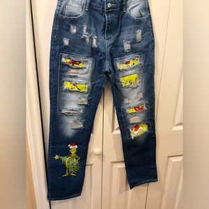 New women’s Grinch jeans  size medium  but fit like a 6